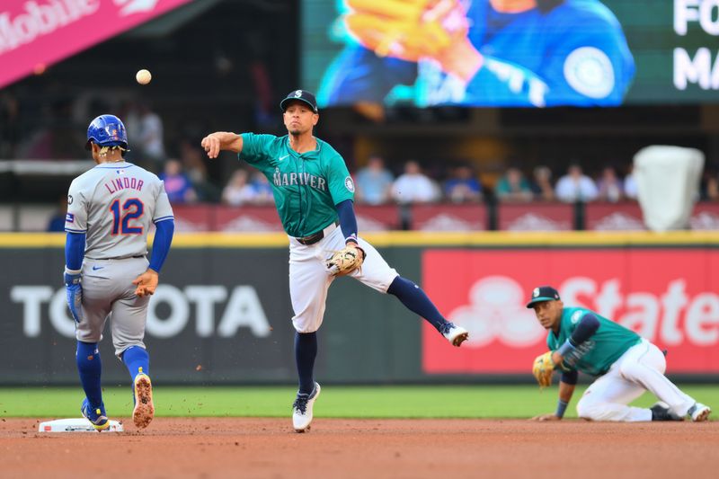 Aug 10, 2024; Seattle, Washington, USA; Seattle Mariners shortstop Leo Rivas (76) throws over New York Mets shortstop Francisco Lindor (12) to complete a double play at first base during the first inning at T-Mobile Park. Mandatory Credit: Steven Bisig-USA TODAY Sports