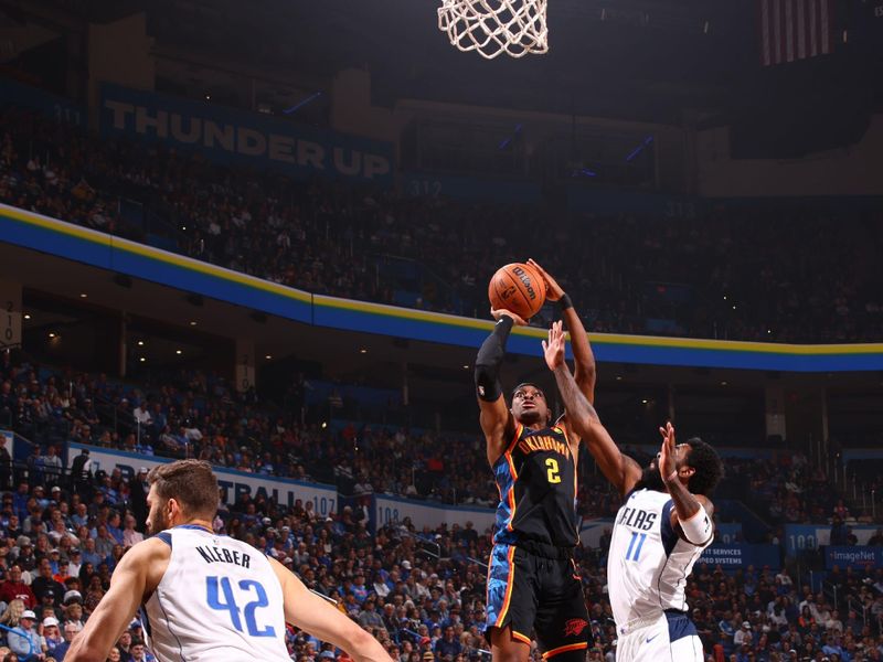 OKLAHOMA CITY, OK - NOVEMBER 17: Shai Gilgeous-Alexander #2 of the Oklahoma City Thunder shoots the ball during the game against the Dallas Mavericks on November 17, 2024 at Paycom Center in Oklahoma City, Oklahoma. NOTE TO USER: User expressly acknowledges and agrees that, by downloading and or using this photograph, User is consenting to the terms and conditions of the Getty Images License Agreement. Mandatory Copyright Notice: Copyright 2024 NBAE (Photo by Zach Beeker/NBAE via Getty Images)