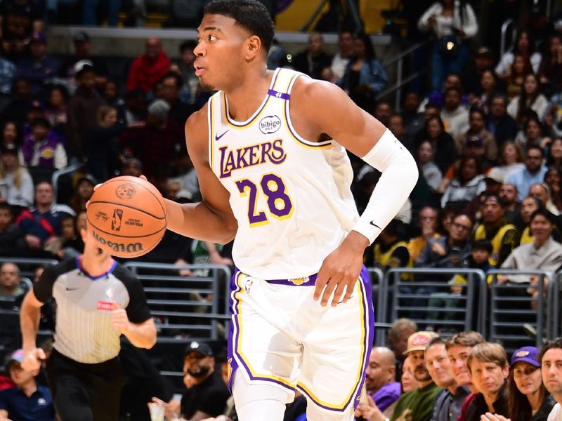 LOS ANGELES, CA - DECEMBER 8: Rui Hachimura #28 of the Los Angeles Lakers dribbles the ball during the game against the Portland Trail Blazers on December 8, 2024 at Crypto.Com Arena in Los Angeles, California. NOTE TO USER: User expressly acknowledges and agrees that, by downloading and/or using this Photograph, user is consenting to the terms and conditions of the Getty Images License Agreement. Mandatory Copyright Notice: Copyright 2024 NBAE (Photo by Adam Pantozzi/NBAE via Getty Images)