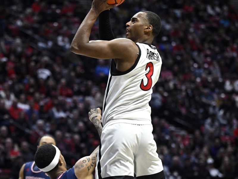 Jan 3, 2024; San Diego, California, USA; San Diego State Aztecs guard Micah Parrish (3) fouls Fresno State Bulldogs guard Isaiah Hill (3) while shooting the ball during the second half at Viejas Arena. Mandatory Credit: Orlando Ramirez-USA TODAY Sports 