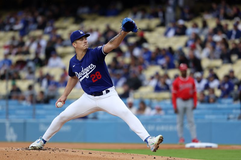 Mar 24, 2024; Los Angeles, California, USA;  Los Angeles Dodgers starting pitcher Bobby Miller (28) pitches during the first inning against the Los Angeles Angels at Dodger Stadium. Mandatory Credit: Kiyoshi Mio-USA TODAY Sports