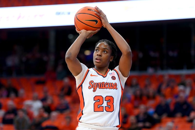 Nov 30, 2023; Syracuse, New York, USA; Syracuse Orange forward Alyssa Latham (23) shoots the ball against the Alabama Crimson Tide during the first half at the JMA Wireless Dome. Mandatory Credit: Rich Barnes-USA TODAY Sports