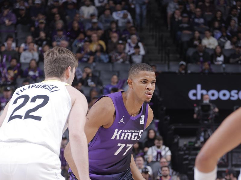 SACRAMENTO, CA - DECEMBER 8: Orlando Robinson #77 of the Sacramento Kings handles the ball during the game against the Utah Jazz on December 8, 2024 at Golden 1 Center in Sacramento, California. NOTE TO USER: User expressly acknowledges and agrees that, by downloading and or using this Photograph, user is consenting to the terms and conditions of the Getty Images License Agreement. Mandatory Copyright Notice: Copyright 2024 NBAE (Photo by Rocky Widner/NBAE via Getty Images)