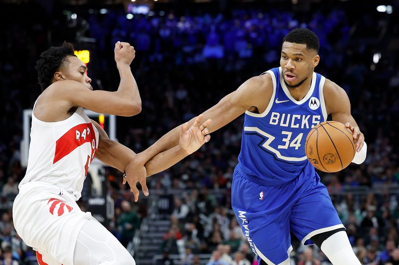 MILWAUKEE, WISCONSIN - JANUARY 17: Giannis Antetokounmpo #34 of the Milwaukee Bucks drives to the basket during the second half of the game against the Toronto Raptors at Fiserv Forum on January 17, 2025 in Milwaukee, Wisconsin. NOTE TO USER: User expressly acknowledges and agrees that, by downloading and or using this photograph, User is consenting to the terms and conditions of the Getty Images License Agreement. (Photo by John Fisher/Getty Images)