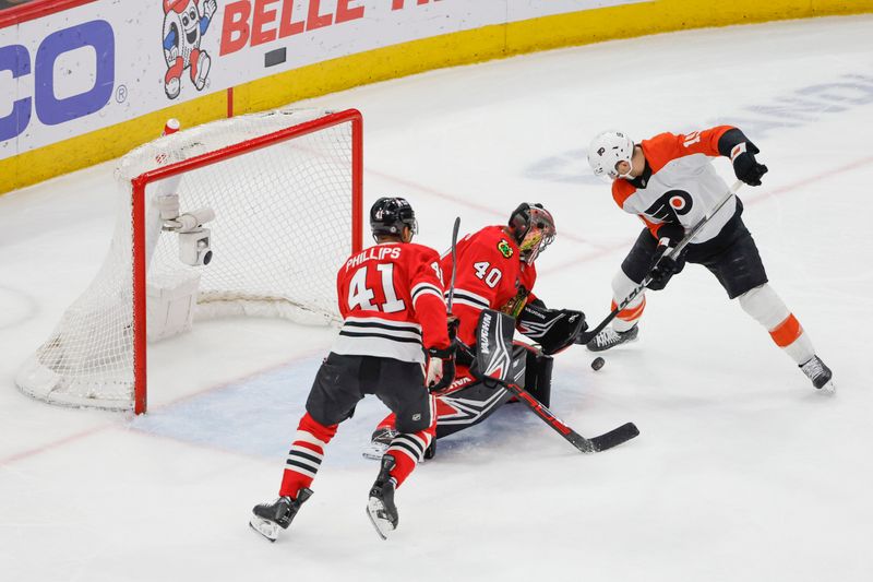 Feb 21, 2024; Chicago, Illinois, USA; Philadelphia Flyers right wing Garnet Hathaway (19) shoots and scores against the Chicago Blackhawks during the second period at United Center. Mandatory Credit: Kamil Krzaczynski-USA TODAY Sports