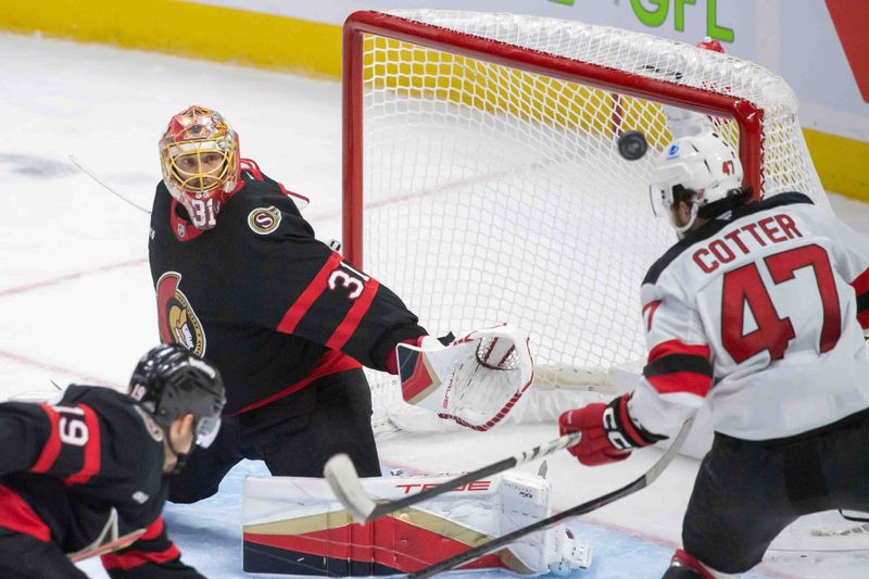 Oct 17, 2024; Ottawa, Ontario, CAN; Ottawa Senators goalie Anton Forsberg (31) follows the puck as is flies past New Jersey Devils center Paul Cotter (47) in the third period at the Canadian Tire Centre. Mandatory Credit: Marc DesRosiers-Imagn Images