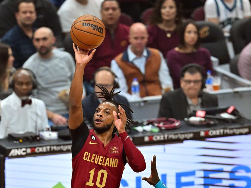 CLEVELAND, OHIO - NOVEMBER 18: Darius Garland #10 of the Cleveland Cavaliers shoots over Mason Plumlee #24 of the Charlotte Hornets during the first quarter at Rocket Mortgage Fieldhouse on November 18, 2022 in Cleveland, Ohio. NOTE TO USER: User expressly acknowledges and agrees that, by downloading and or using this photograph, User is consenting to the terms and conditions of the Getty Images License Agreement. (Photo by Jason Miller/Getty Images)