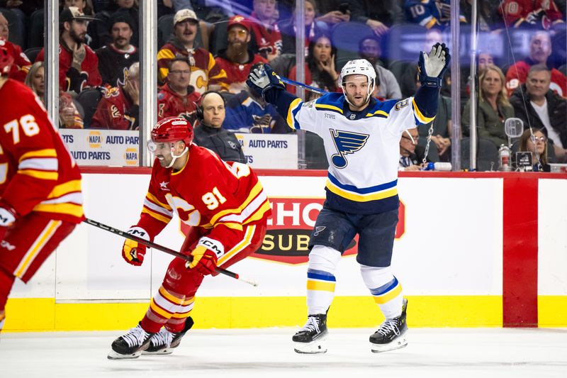 Dec 5, 2024; Calgary, Alberta, CAN; St. Louis Blues left wing Nathan Walker (26) pleads his case to a referee after penalty calls against both him and Calgary Flames center Nazem Kadri (91)at Scotiabank Saddledome. Mandatory Credit: Brett Holmes-Imagn Images