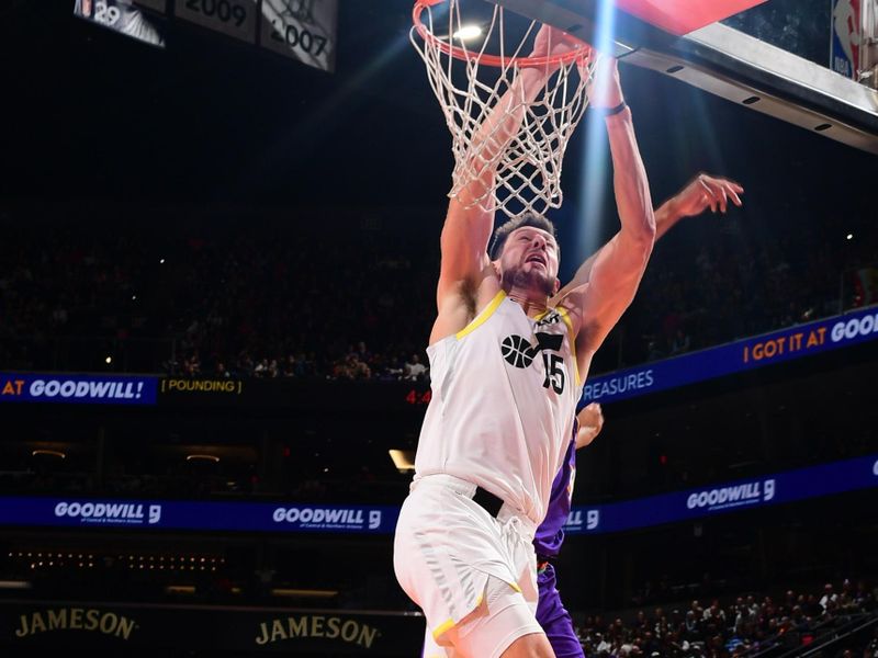 PHOENIX, AZ - JANUARY 11: Drew Eubanks #15 of the Utah Jazz drives to the basket during the game against the Phoenix Suns on January 11, 2025 at Footprint Center in Phoenix, Arizona. NOTE TO USER: User expressly acknowledges and agrees that, by downloading and or using this photograph, user is consenting to the terms and conditions of the Getty Images License Agreement. Mandatory Copyright Notice: Copyright 2025 NBAE (Photo by Kate Frese/NBAE via Getty Images)