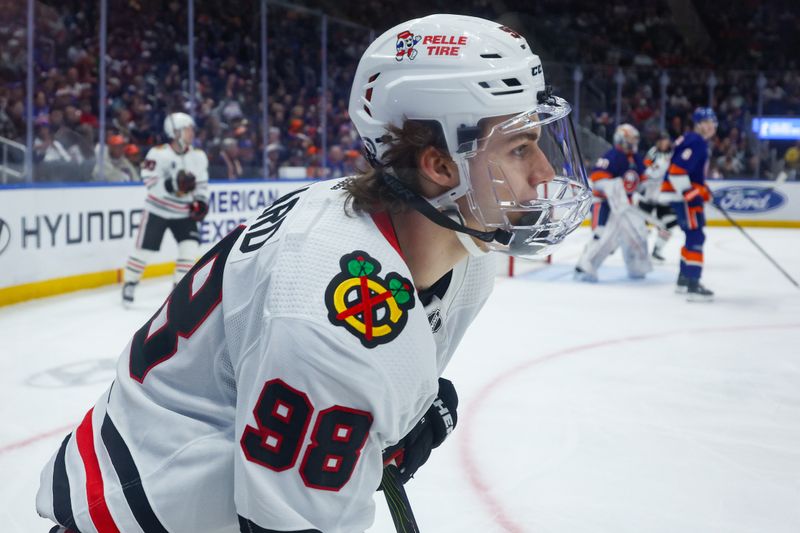 Apr 2, 2024; Elmont, New York, USA; Chicago Blackhawks center Connor Bedard (98) looks up ice against the New York Islanders during the third period at UBS Arena. Mandatory Credit: Thomas Salus-USA TODAY Sports