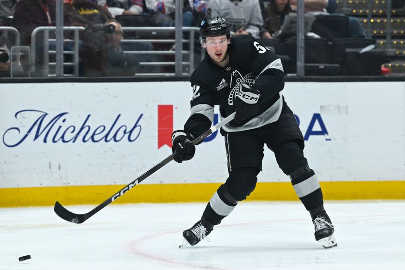 Feb 28, 2026; Los Angeles, California, USA; Los Angeles Kings right wing Taylor Ward (52) advances the puck during the first period against the Calgary Flames at Crypto.com Arena. Mandatory Credit: Griffin Hooper-Imagn Images