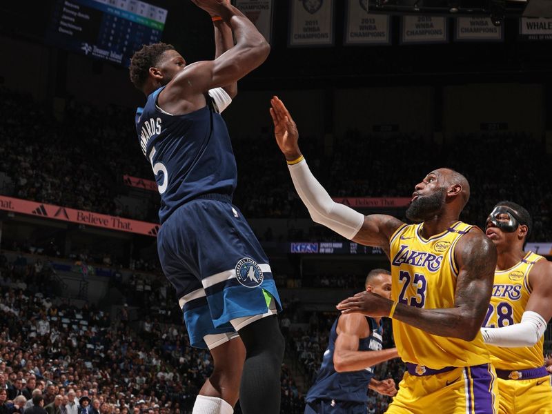 MINNEAPOLIS, MN -  APRIL 25:  Anthony Edwards #5 of the Minnesota Timberwolves shoots the ball during the game against the Los Angeles Lakers   during Round 1 Game 3 of the 2025 NBA Playoffs  on April 25, 2025 at Target Center in Minneapolis, Minnesota. NOTE TO USER: User expressly acknowledges and agrees that, by downloading and or using this Photograph, user is consenting to the terms and conditions of the Getty Images License Agreement. Mandatory Copyright Notice: Copyright 2025 NBAE (Photo by David Sherman/NBAE via Getty Images)