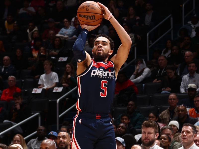 WASHINGTON, DC -? FEBRUARY 7: Tyus Jones #5 of the Washington Wizards shoots the ball during the game against the Cleveland Cavaliers on February 7, 2024 at Capital One Arena in Washington, DC. NOTE TO USER: User expressly acknowledges and agrees that, by downloading and or using this Photograph, user is consenting to the terms and conditions of the Getty Images License Agreement. Mandatory Copyright Notice: Copyright 2024 NBAE (Photo by Kenny Giarla/NBAE via Getty Images)