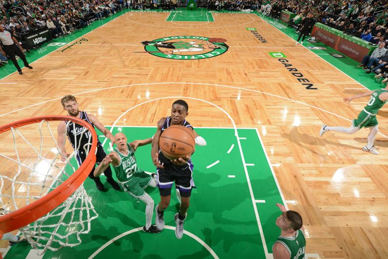 BOSTON, MA - APRIL 5:  De'Aaron Fox #5 of the Sacramento Kings shoots the ball during the game against the Boston Celtics on April 5, 2024 at the TD Garden in Boston, Massachusetts. NOTE TO USER: User expressly acknowledges and agrees that, by downloading and or using this photograph, User is consenting to the terms and conditions of the Getty Images License Agreement. Mandatory Copyright Notice: Copyright 2024 NBAE  (Photo by Brian Babineau/NBAE via Getty Images)