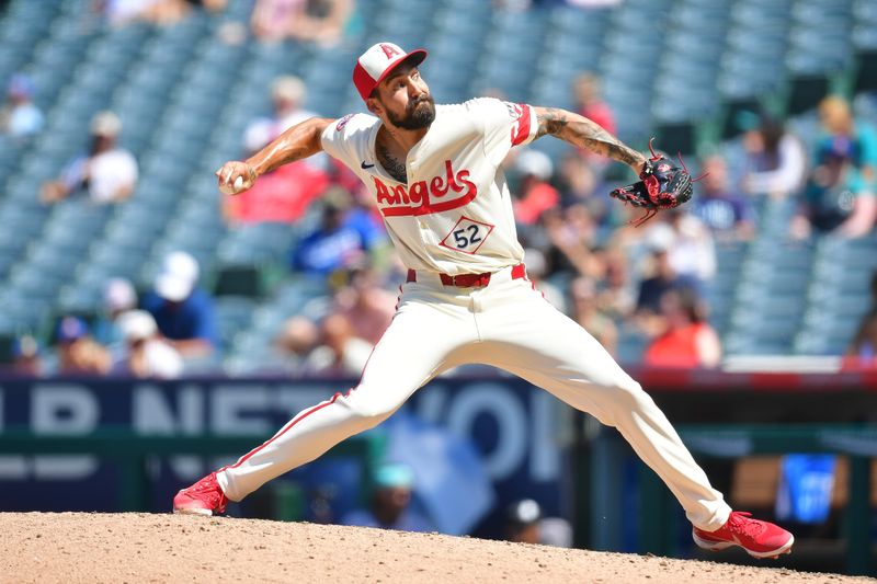 Jul 14, 2024; Anaheim, California, USA; Los Angeles Angels pitcher Hans Crouse (52) throws against the Seattle Mariners during the eighth inning at Angel Stadium. Mandatory Credit: Gary A. Vasquez-USA TODAY Sports