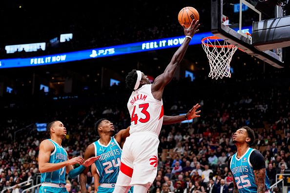 TORONTO, ON - DECEMBER 18: Pascal Siakam #43 of the Toronto Raptors goes to the basket against the Charlotte Hornets during first half NBA action at Scotiabank Arena on December 18, 2023 in Toronto, Ontario, Canada. NOTE TO USER: User expressly acknowledges and agrees that, by downloading and/or using this Photograph, user is consenting to the terms and conditions of the Getty Images License Agreement. (Photo by Andrew Lahodynskyj/Getty Images)