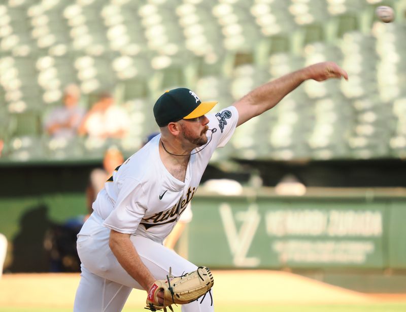 Jul 22, 2024; Oakland, California, USA; Oakland Athletics starting pitcher Hogan Harris (63) pitches the ball against the Houston Astros during the first inning at Oakland-Alameda County Coliseum. Mandatory Credit: Kelley L Cox-USA TODAY Sports