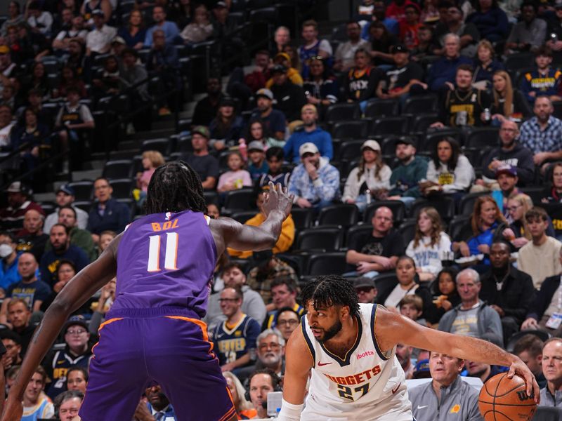 DENVER, CO - OCTOBER 13: Jamal Murray #27 of the Denver Nuggets dribbles the ball during the game against the Phoenix Suns on October 13, 2024 at Ball Arena in Denver, Colorado. NOTE TO USER: User expressly acknowledges and agrees that, by downloading and/or using this Photograph, user is consenting to the terms and conditions of the Getty Images License Agreement. Mandatory Copyright Notice: Copyright 2024 NBAE (Photo by Bart Young/NBAE via Getty Images)