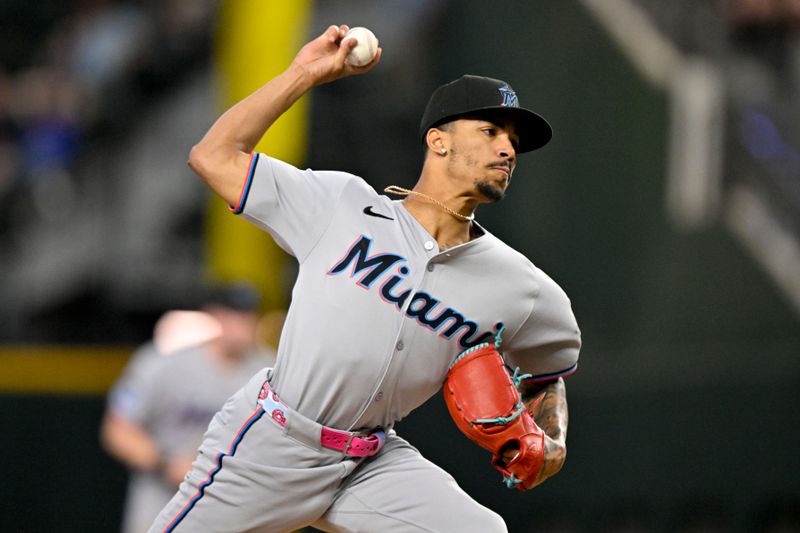 Sep 21, 2025; Arlington, Texas, USA; Miami Marlins relief pitcher Ronny Henriquez (32) pitches against the Texas Rangers during the seventh inning at Globe Life Field. Mandatory Credit: Jerome Miron-Imagn Images