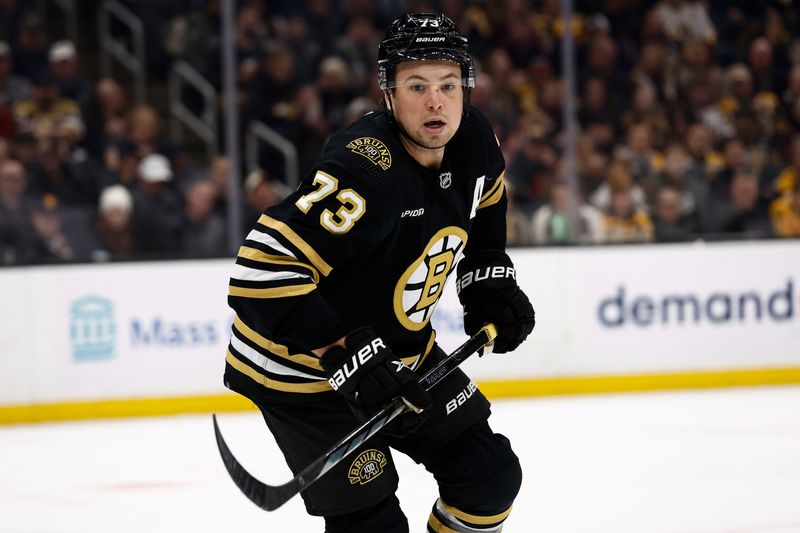 Feb 29, 2024; Boston, Massachusetts, USA; Boston Bruins defenseman Charlie McAvoy (73) skates against the Vegas Golden Knights during the seond period at TD Garden. Mandatory Credit: Winslow Townson-USA TODAY Sports