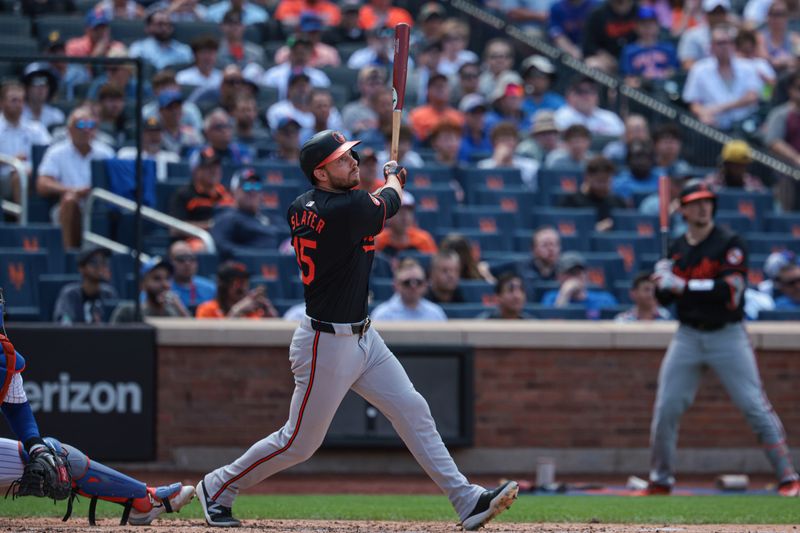 Aug 21, 2024; New York City, New York, USA; Baltimore Orioles right fielder Austin Slater (15) hits a two run home run during the sixth inning against the New York Mets at Citi Field. Mandatory Credit: Vincent Carchietta-USA TODAY Sports