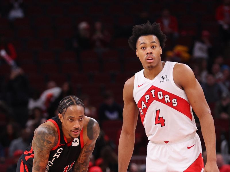 CHICAGO, ILLINOIS - JANUARY 30: DeMar DeRozan #11 of the Chicago Bulls and Scottie Barnes #4 of the Toronto Raptors look on during the second half at the United Center on January 30, 2024 in Chicago, Illinois. NOTE TO USER: User expressly acknowledges and agrees that, by downloading and or using this photograph, User is consenting to the terms and conditions of the Getty Images License Agreement.  (Photo by Michael Reaves/Getty Images)