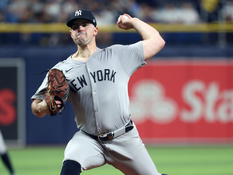 Jul 9, 2024; St. Petersburg, Florida, USA;  New York Yankees starting pitcher Carlos Rodon (55) throws a pitch against the Tampa Bay Rays during the second inning at Tropicana Field. Mandatory Credit: Kim Klement Neitzel-USA TODAY Sports