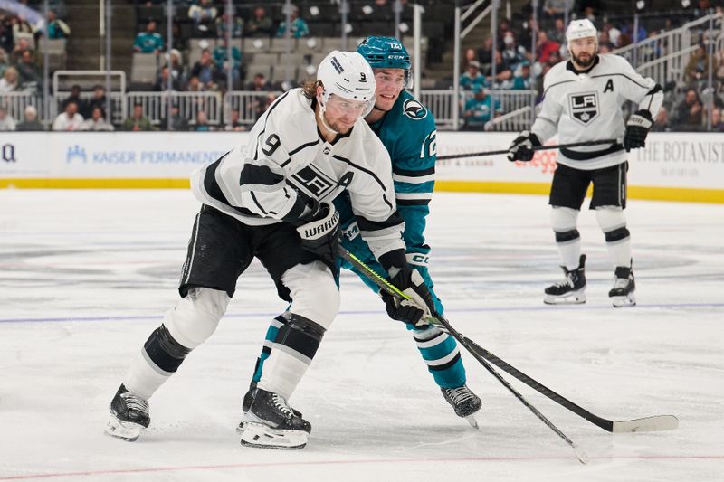 Apr 4, 2024; San Jose, California, USA; San Jose Sharks left wing William Eklund (72) defends against Los Angeles Kings right wing Adrian Kempe (9) during the third period at SAP Center at San Jose. Mandatory Credit: Robert Edwards-USA TODAY Sports