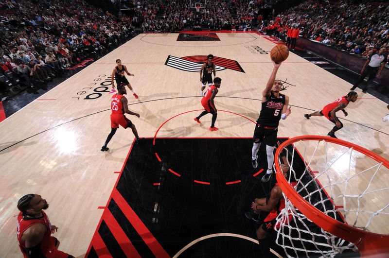 PORTLAND, OR - APRIL 12: Dalano Banton #5 of the Portland Trail Blazers shoots the ball during the game against the Houston Rockets on April 12, 2024 at the Moda Center Arena in Portland, Oregon. NOTE TO USER: User expressly acknowledges and agrees that, by downloading and or using this photograph, user is consenting to the terms and conditions of the Getty Images License Agreement. Mandatory Copyright Notice: Copyright 2024 NBAE (Photo by Cameron Browne/NBAE via Getty Images)