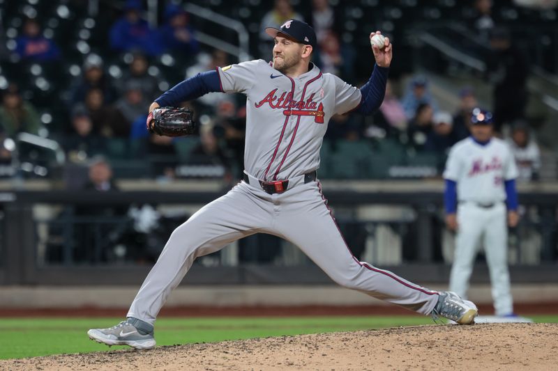 May 12, 2024; New York City, New York, USA; Atlanta Braves relief pitcher Dylan Lee (52) delivers a pitch during the eighth inning against the New York Mets at Citi Field. Mandatory Credit: Vincent Carchietta-USA TODAY Sports