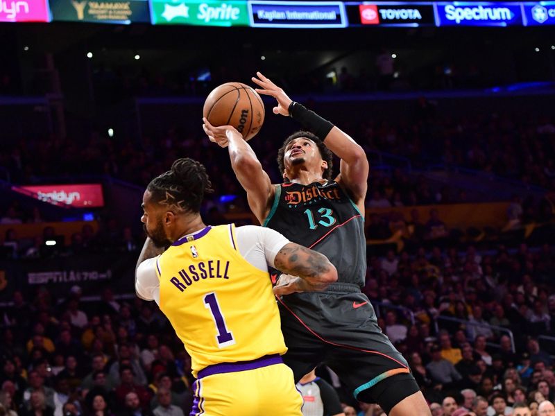 LOS ANGELES, CA - FEBRUARY 29: Jordan Poole #13 of the Washington Wizards drives to the basket during the game against the Los Angeles Lakers on February 29, 2024 at Crypto.Com Arena in Los Angeles, California. NOTE TO USER: User expressly acknowledges and agrees that, by downloading and/or using this Photograph, user is consenting to the terms and conditions of the Getty Images License Agreement. Mandatory Copyright Notice: Copyright 2024 NBAE (Photo by Adam Pantozzi/NBAE via Getty Images)