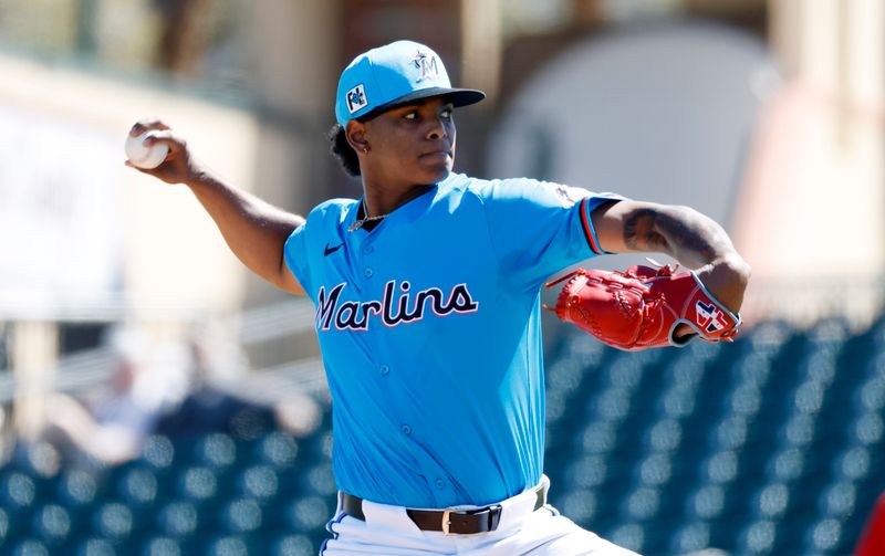 Feb 25, 2025; Jupiter, Florida, USA; Miami Marlins starting pitcher Edward Cabrera (27) throws against the Washington Nationals during the first inning at Roger Dean Chevrolet Stadium. Mandatory Credit: Rhona Wise-Imagn Images