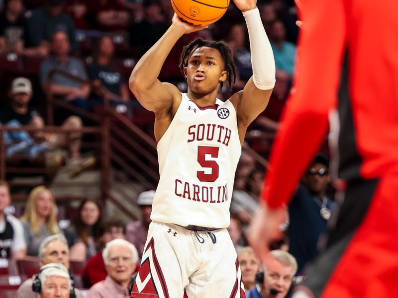 Mar 4, 2023; Columbia, South Carolina, USA; South Carolina Gamecocks guard Meechie Johnson (5) attempts a three point basket against the Georgia Bulldogs in the first half at Colonial Life Arena. Mandatory Credit: Jeff Blake-USA TODAY Sports