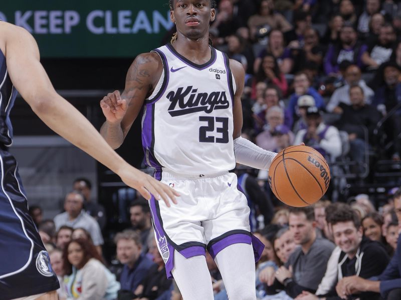 SACRAMENTO, CA - MARCH 29:  Keon Ellis #23 of the Sacramento Kings handles the ball during the game  on March 29, 2024 at Golden 1 Center in Sacramento, California. NOTE TO USER: User expressly acknowledges and agrees that, by downloading and or using this Photograph, user is consenting to the terms and conditions of the Getty Images License Agreement. Mandatory Copyright Notice: Copyright 2024 NBAE (Photo by Rocky Widner/NBAE via Getty Images)