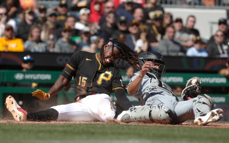 Apr 9, 2023; Pittsburgh, Pennsylvania, USA;  Chicago White Sox catcher Seby Zavala (44) tags Pittsburgh Pirates shortstop Oneil Cruz (15) out at home plate attempting to score during the sixth inning at PNC Park. Cruz suffered an apparent injury on the play and left the game. Mandatory Credit: Charles LeClaire-USA TODAY Sports