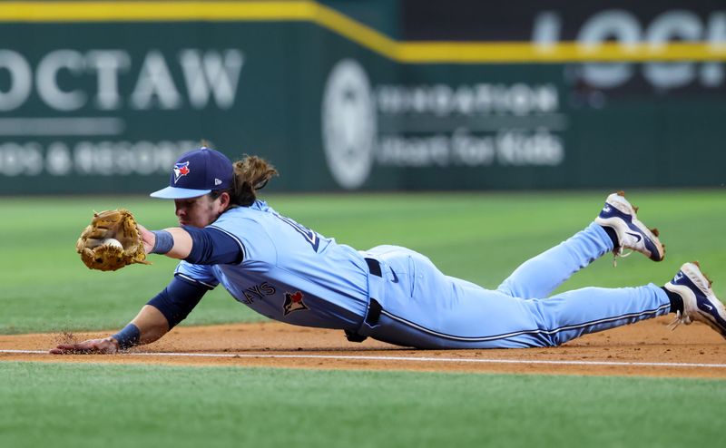 Sep 18, 2024; Arlington, Texas, USA;  Toronto Blue Jays third baseman Addison Barger (47) dives to field a ground ball during the third inning against the Texas Rangers at Globe Life Field. Mandatory Credit: Kevin Jairaj-Imagn Images