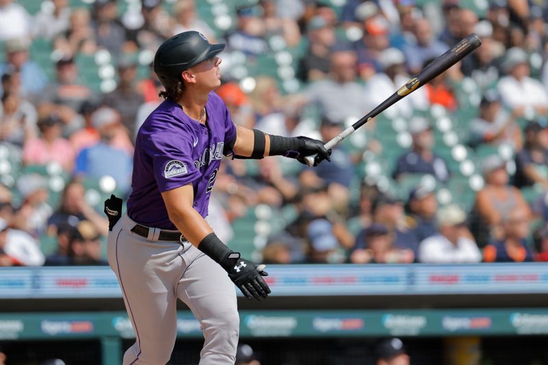 Sep 12, 2024; Detroit, Michigan, USA;  Colorado Rockies outfielder Jordan Beck (27) hits a home run in the third inning against the Detroit Tigers at Comerica Park. Mandatory Credit: Rick Osentoski-Imagn Images