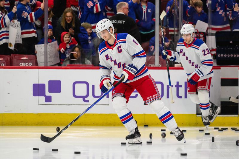 Feb 9, 2024; Chicago, Illinois, USA; New York Rangers defenseman Jacob Trouba (8) warms up against the Chicago Blackhawks before the game at the United Center. Mandatory Credit: Daniel Bartel-USA TODAY Sports