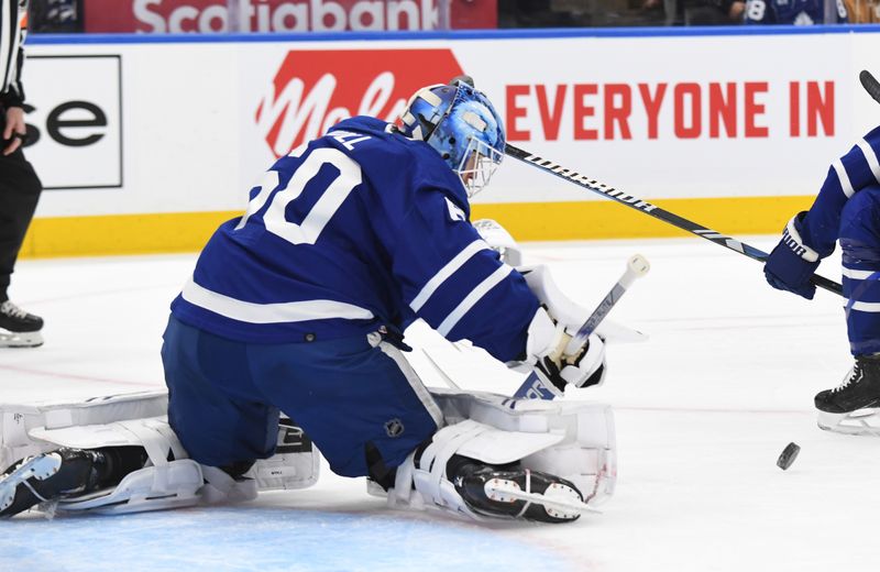 May 2, 2024; Toronto, Ontario, CAN;   Toronto Maple Leafs goalie Joseph Woll (60) makes a save against the Boston Bruins in the second period in game six of the first round of the 2024 Stanley Cup Playoffs at Scotiabank Arena. Mandatory Credit: Dan Hamilton-USA TODAY Sports