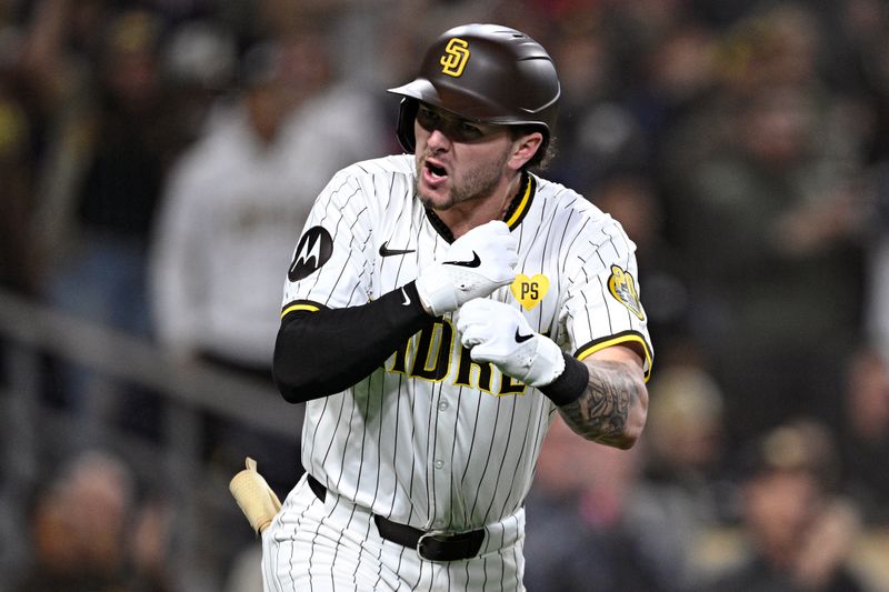 May 13, 2024; San Diego, California, USA; San Diego Padres center fielder Jackson Merrill (3) celebrates after hitting a home run during the seventh inning against the Colorado Rockies at Petco Park. Mandatory Credit: Orlando Ramirez-USA TODAY Sports