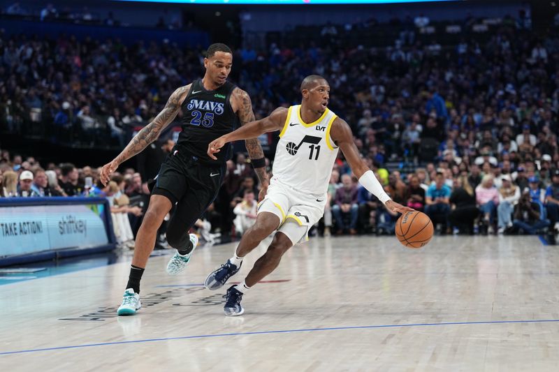 DALLAS, TX - MARCH 21: Kris Dunn #11 of the Utah Jazz dribbles the ball during the game against the Dallas Mavericks on March 21, 2024 at the American Airlines Center in Dallas, Texas. NOTE TO USER: User expressly acknowledges and agrees that, by downloading and or using this photograph, User is consenting to the terms and conditions of the Getty Images License Agreement. Mandatory Copyright Notice: Copyright 2024 NBAE (Photo by Glenn James/NBAE via Getty Images)