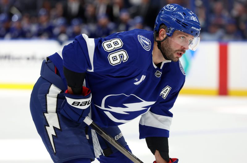 Oct 24, 2024; Tampa, Florida, USA; Tampa Bay Lightning right wing Nikita Kucherov (86) looks on against the Minnesota Wild during the first period at Amalie Arena. Mandatory Credit: Kim Klement Neitzel-Imagn Images