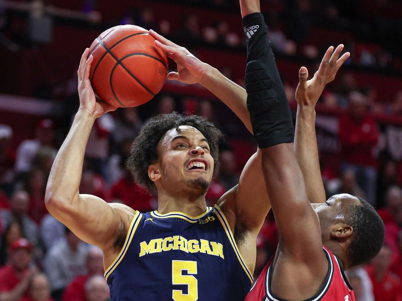 Feb 29, 2024; Piscataway, New Jersey, USA; Michigan Wolverines forward Terrance Williams II (5) drives for a shot against Michigan Wolverines forward Terrance Williams II (5) during the first half at Jersey Mike's Arena. Mandatory Credit: Vincent Carchietta-USA TODAY Sports