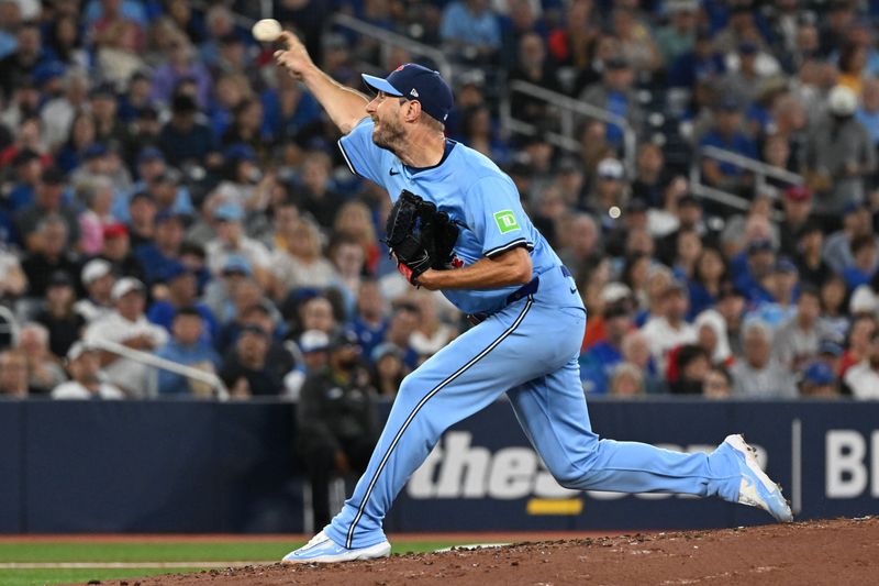 Sep 24, 2025; Toronto, Ontario, CAN;  Toronto Blue Jays starting pitcher Max Scherzer (31) delivers a pitch against the Boston Red Sox in the fourth inning at Rogers Centre. Mandatory Credit: Dan Hamilton-Imagn Images