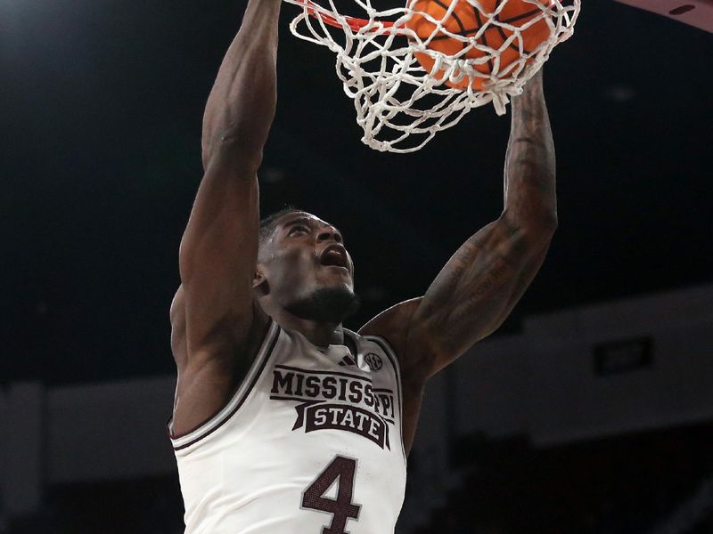 Dec 3, 2023; Starkville, Mississippi, USA; Mississippi State Bulldogs forward Cameron Matthews (4) dunks during the second half against the Southern Jaguars at Humphrey Coliseum. Mandatory Credit: Petre Thomas-USA TODAY Sports