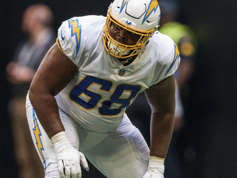 Los Angeles Chargers guard Jamaree Salyer (68) lines up during the first half of an NFL football game against the Atlanta Falcons, Sunday, Nov. 6, 2022, in Atlanta. The Los Angeles Chargers won 20-17. (AP Photo/Danny Karnik)