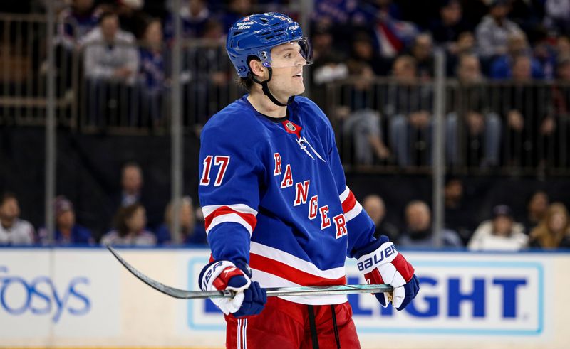 Jan 18, 2025; New York, New York, USA; New York Rangers defenseman Will Borgen (17) skates against the Columbus Blue Jackets during the second period at Madison Square Garden. Mandatory Credit: Danny Wild-Imagn Images