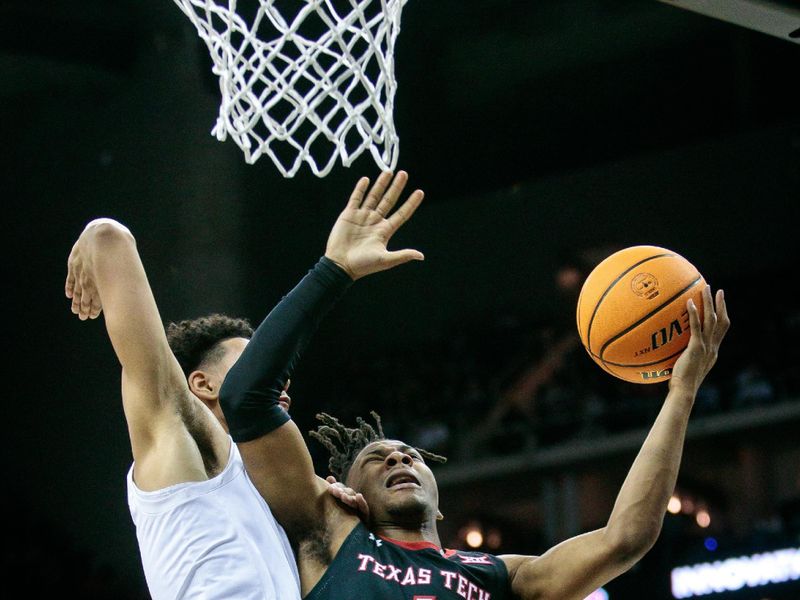 Mar 8, 2023; Kansas City, MO, USA; Texas Tech Red Raiders guard Lamar Washington (1) puts up a shot around West Virginia Mountaineers forward Emmitt Matthews Jr. (1) during the second half at T-Mobile Center. Mandatory Credit: William Purnell-USA TODAY Sports