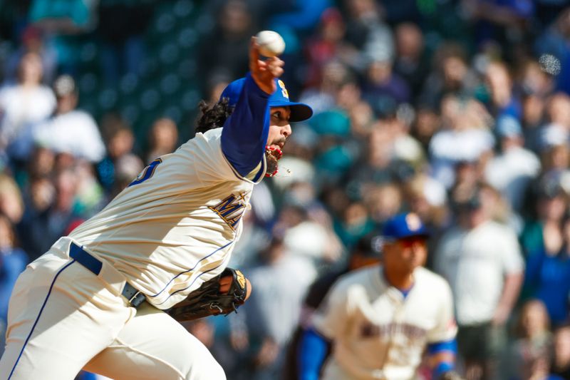 Apr 13, 2025; Seattle, Washington, USA; Seattle Mariners pitcher Andrés Muñoz (75) throws against the Texas Rangers during the ninth inning at T-Mobile Park. Mandatory Credit: Joe Nicholson-Imagn Images