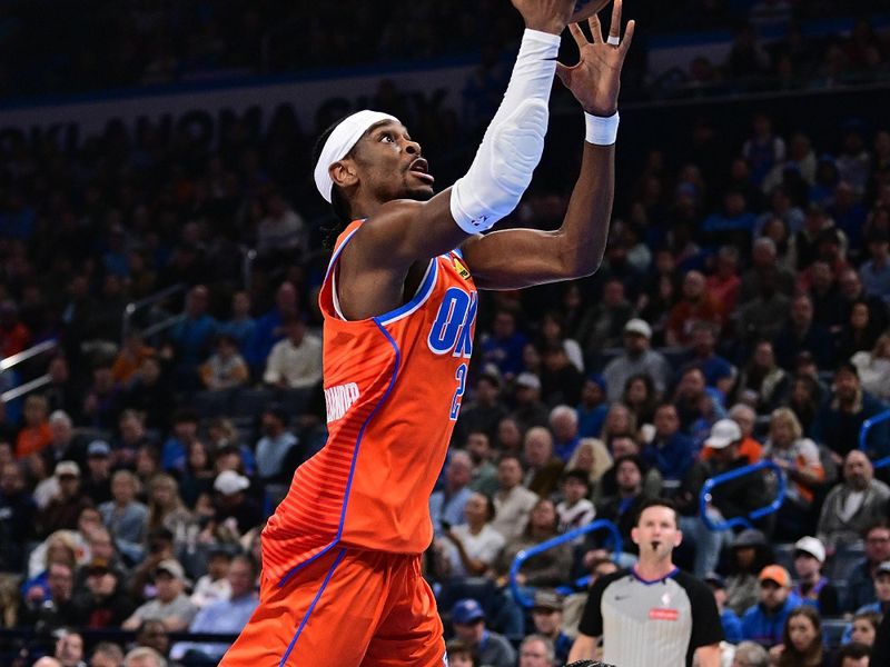 OKLAHOMA CITY, OKLAHOMA - JANUARY 03: Shai Gilgeous-Alexander #2 of the Oklahoma City Thunder rises up for a shot during the first half against the New York Knicks at Paycom Center on January 3, 2025 in Oklahoma City, Oklahoma. NOTE TO USER: User expressly acknowledges and agrees that, by downloading and or using this photograph, User is consenting to the terms and conditions of the Getty Images License Agreement. (Photo by Joshua Gateley/Getty Images)